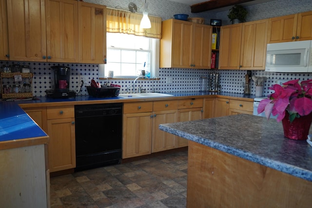 kitchen featuring sink and dishwasher