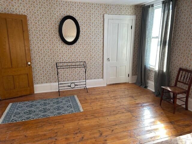 sitting room featuring hardwood / wood-style floors