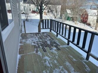 view of snow covered deck