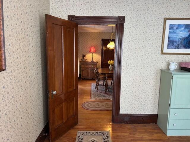 corridor featuring hardwood / wood-style flooring