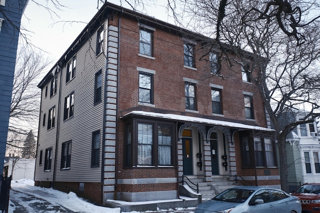 view of snow covered property