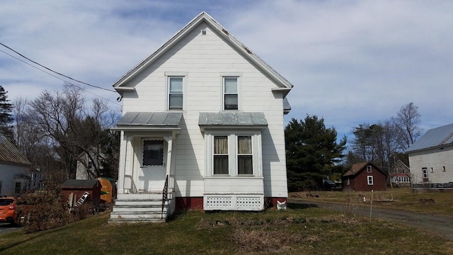 view of front of home with a front lawn