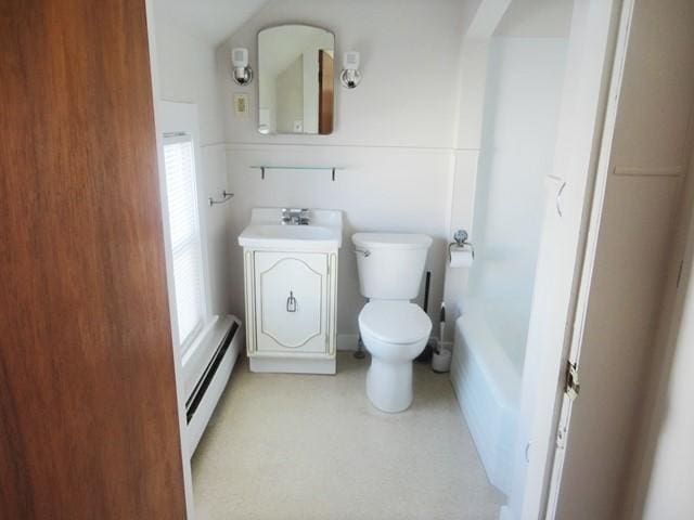 bathroom with vanity, a baseboard heating unit, and toilet