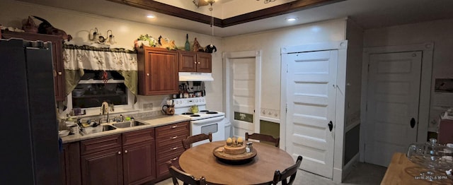 kitchen featuring sink and electric range