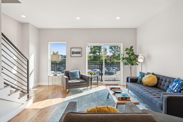 living room with light hardwood / wood-style flooring