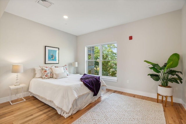 bedroom featuring light wood-type flooring