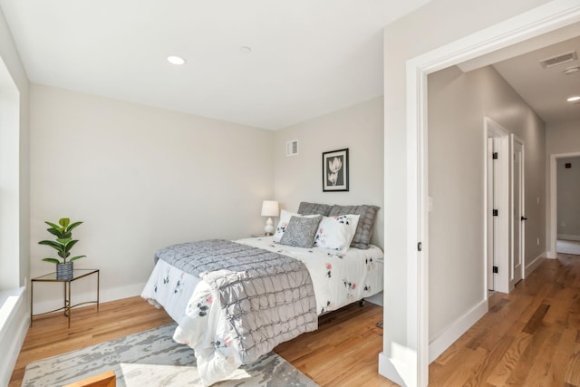 bedroom featuring wood-type flooring