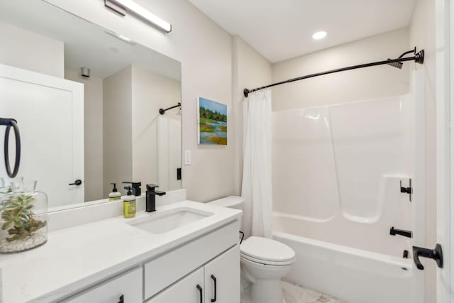 full bathroom with vanity, shower / bath combination with curtain, and toilet