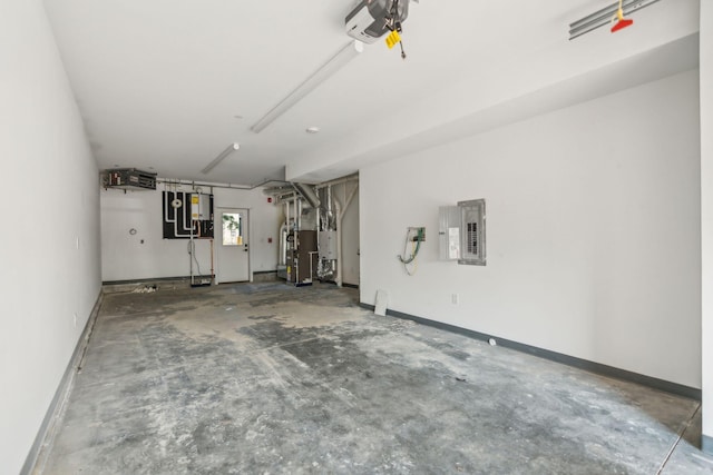 garage featuring a garage door opener and electric panel