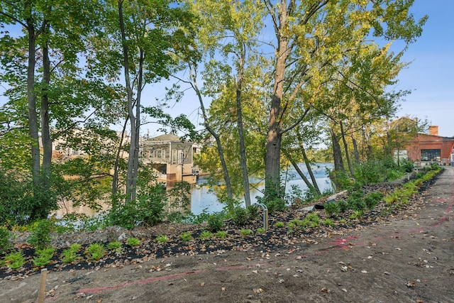 view of side of property featuring a water view