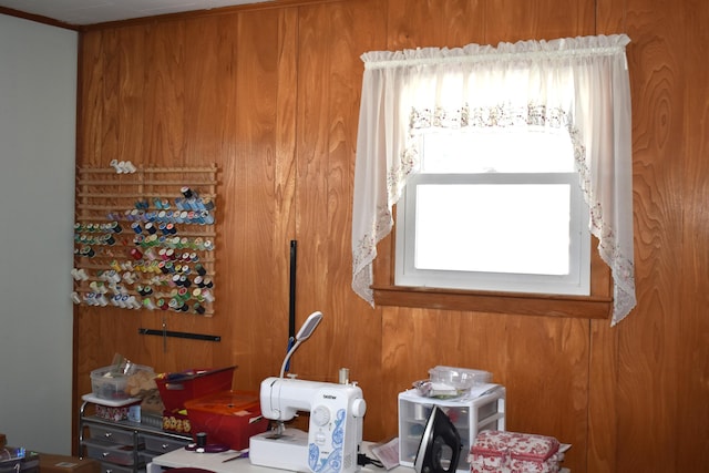 miscellaneous room featuring wooden walls