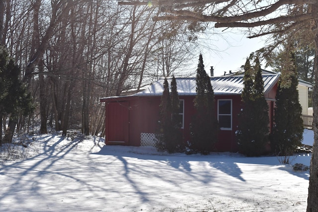 view of snow covered property