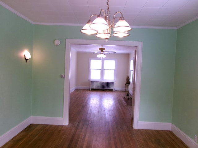 unfurnished dining area with crown molding, radiator heating unit, dark wood-type flooring, and ceiling fan with notable chandelier