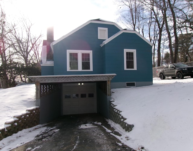 view of front of property featuring a garage