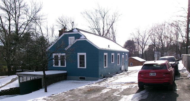 view of snow covered property