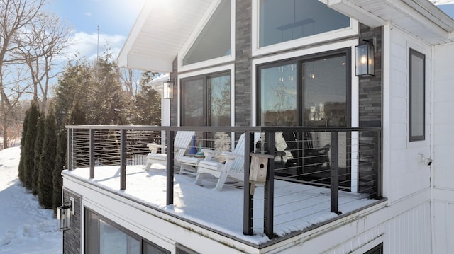 view of snow covered deck