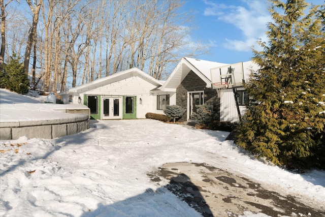view of snow covered property