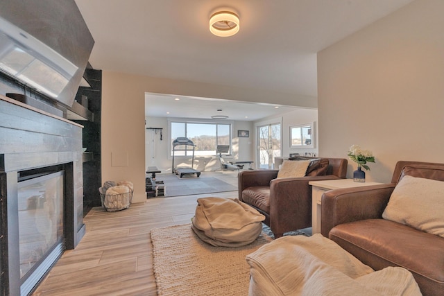 living room with light hardwood / wood-style floors