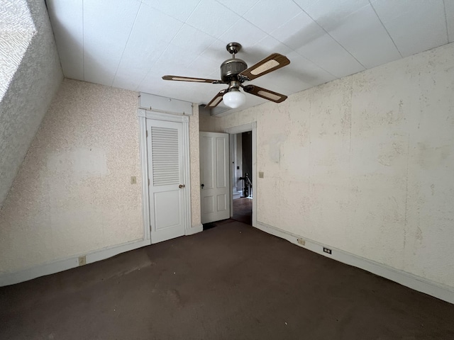 unfurnished bedroom featuring ceiling fan