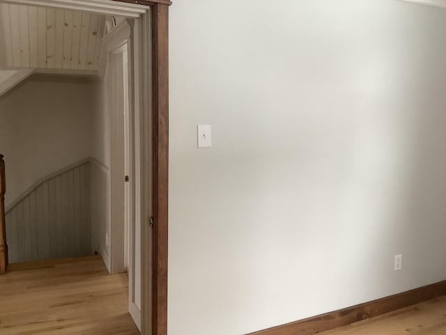 corridor featuring light hardwood / wood-style flooring