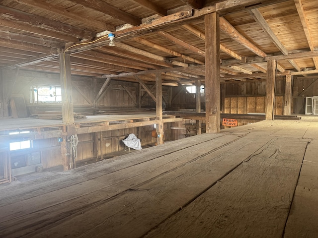 miscellaneous room featuring beam ceiling