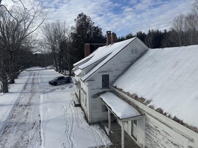 view of snow covered property