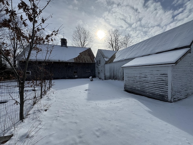 view of yard covered in snow