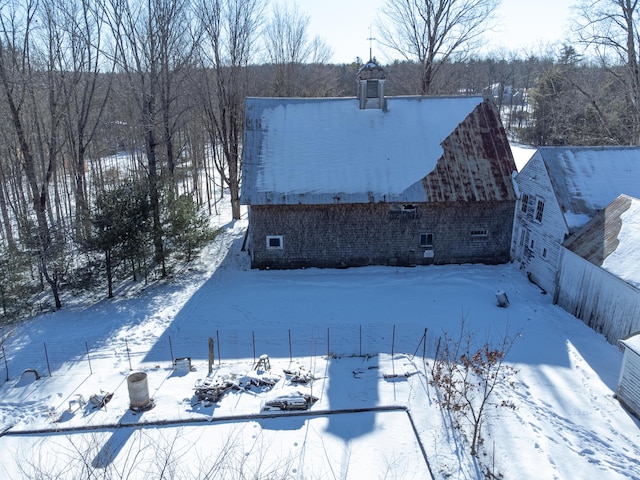 view of snow covered house