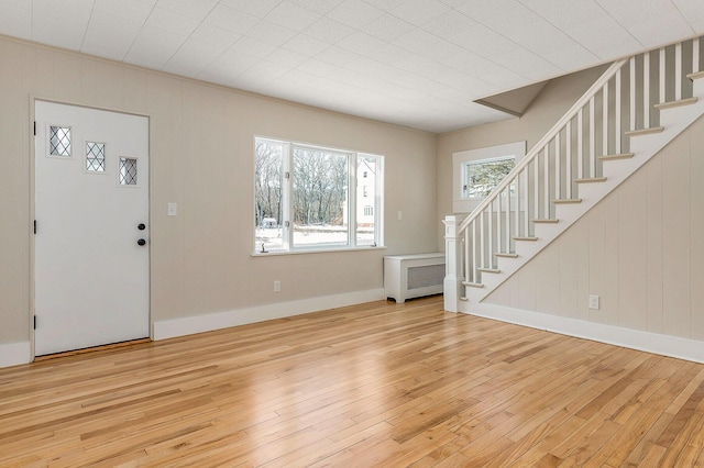 entryway featuring radiator and light hardwood / wood-style floors