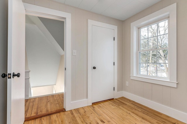 unfurnished bedroom featuring light wood-type flooring