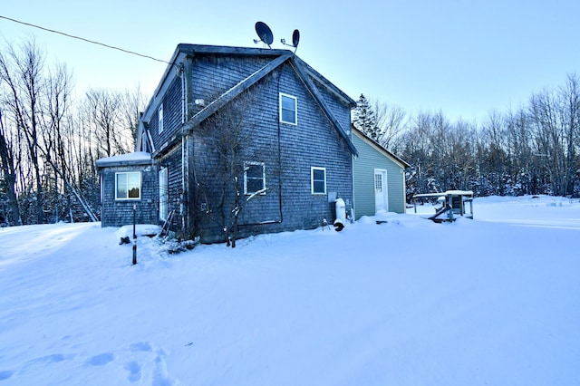 view of snow covered property