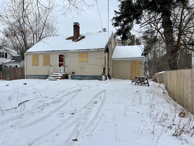 view of snow covered house