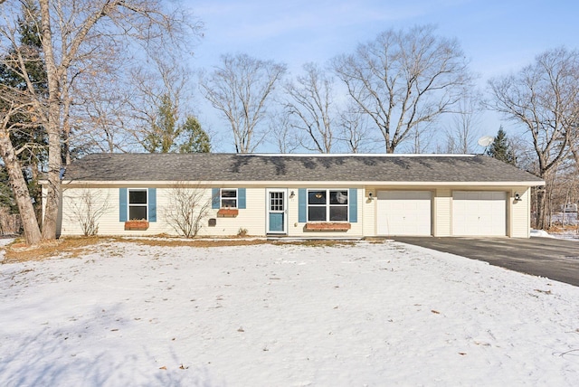 single story home with a garage