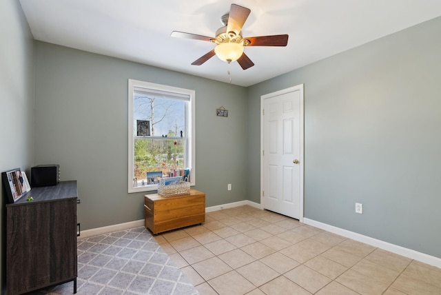 tiled bedroom with ceiling fan