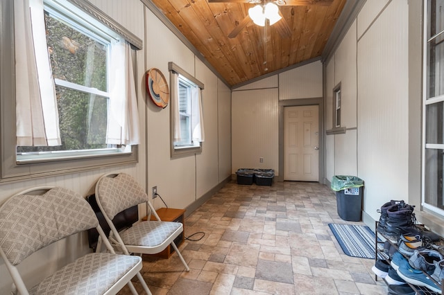 sitting room featuring lofted ceiling, a healthy amount of sunlight, and wooden ceiling