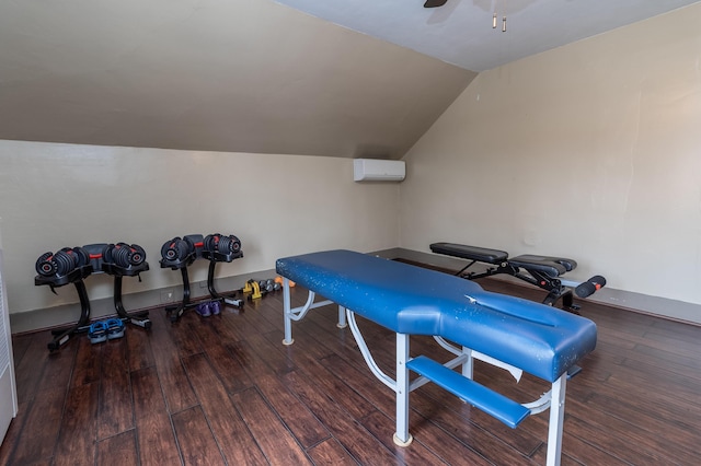 exercise room featuring ceiling fan, an AC wall unit, lofted ceiling, and dark hardwood / wood-style flooring