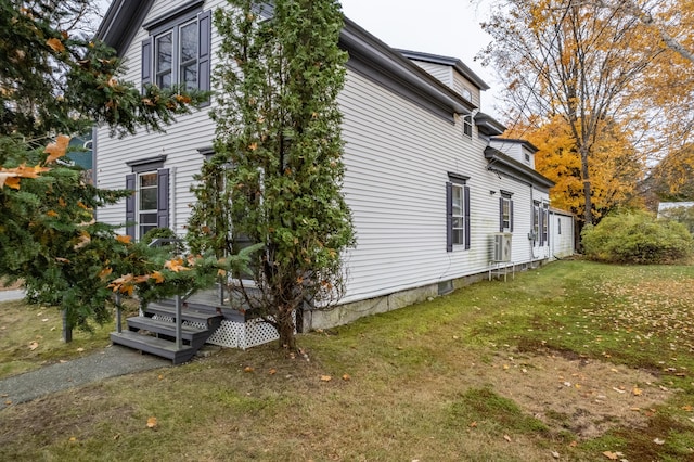 view of home's exterior featuring a lawn