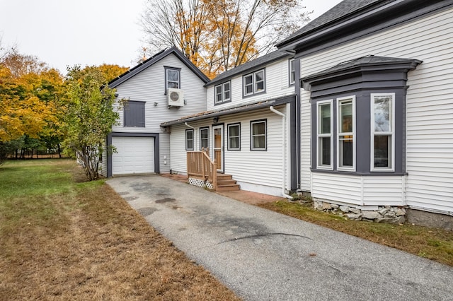 view of property featuring a front yard