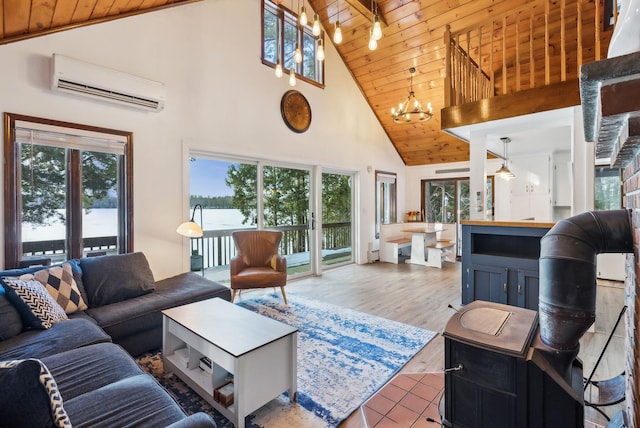 living room featuring an inviting chandelier, a wall mounted air conditioner, wooden ceiling, and a healthy amount of sunlight