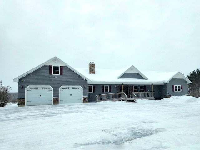 305 Fuller Rd, Easton, ME 04740 - view of front of house featuring a chimney, stone siding, and a porch