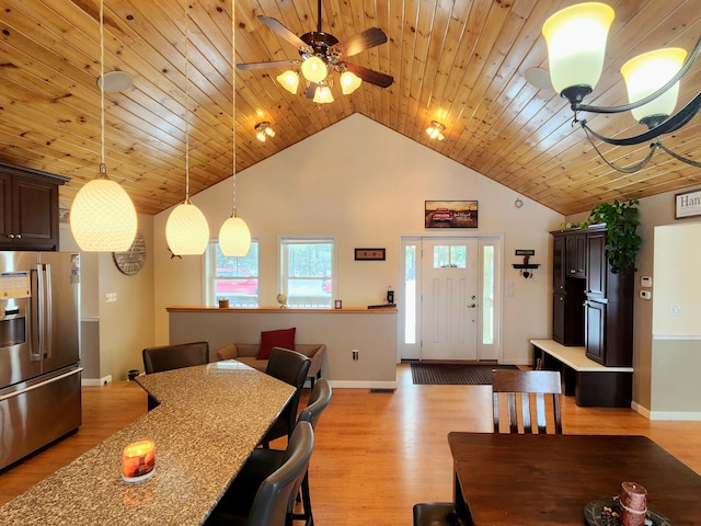 305 Fuller Rd, Easton, ME 04740 - dining area with light wood finished floors, baseboards, ceiling fan, wooden ceiling, and vaulted ceiling