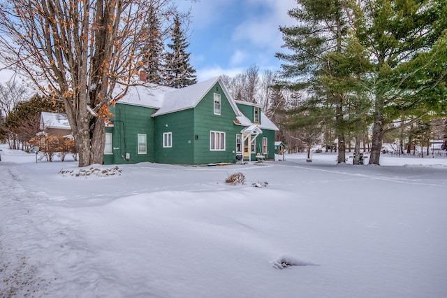 view of snow covered property