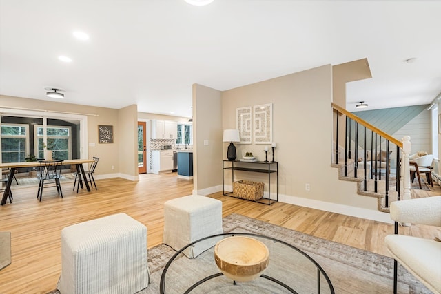 living room with light hardwood / wood-style floors