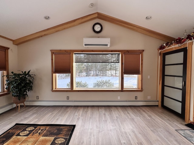 interior space with vaulted ceiling, an AC wall unit, baseboard heating, and light wood-type flooring