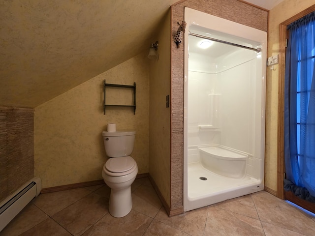 full bath featuring lofted ceiling, toilet, a baseboard heating unit, a stall shower, and tile patterned flooring