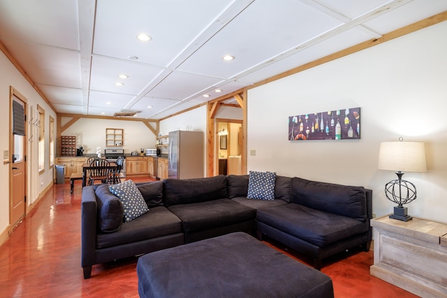 living room with coffered ceiling