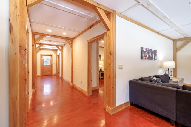 corridor with concrete flooring