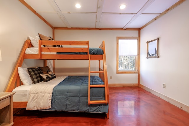 bedroom featuring concrete floors