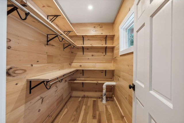 walk in closet featuring light wood-type flooring