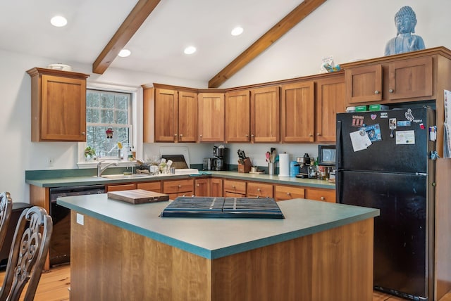 kitchen featuring a kitchen island, vaulted ceiling with beams, and black appliances